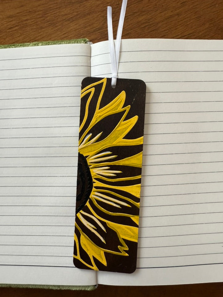Sunflower design bookmark on a notebook page
